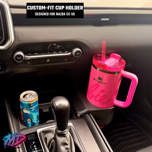 Pink Stanley cup with straw in a custom-fit cup holder for Mazda CX-50